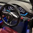 dashboard-driver-dynamic-trim-panels-wheel-led-integrated-porsche-panamera-600x600.webp
